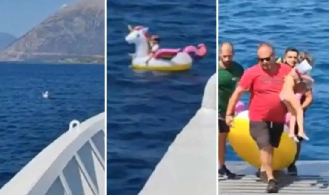 bimba al largo in grecia con un unicorno gonfiabile-13