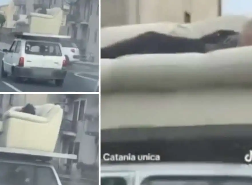 a catania un uomo e sdraiato su un divano trasportato da una macchina 