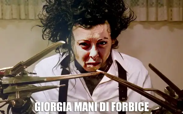 giorgia meloni mani di forbice tagli manovra